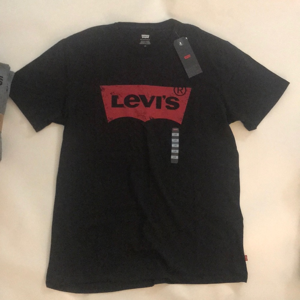 Brand new with tags size L distress logo